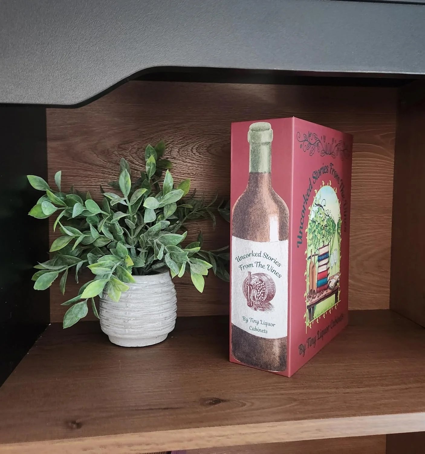 Uncorked Stories from the Vines hidden wine book displayed on a shelf