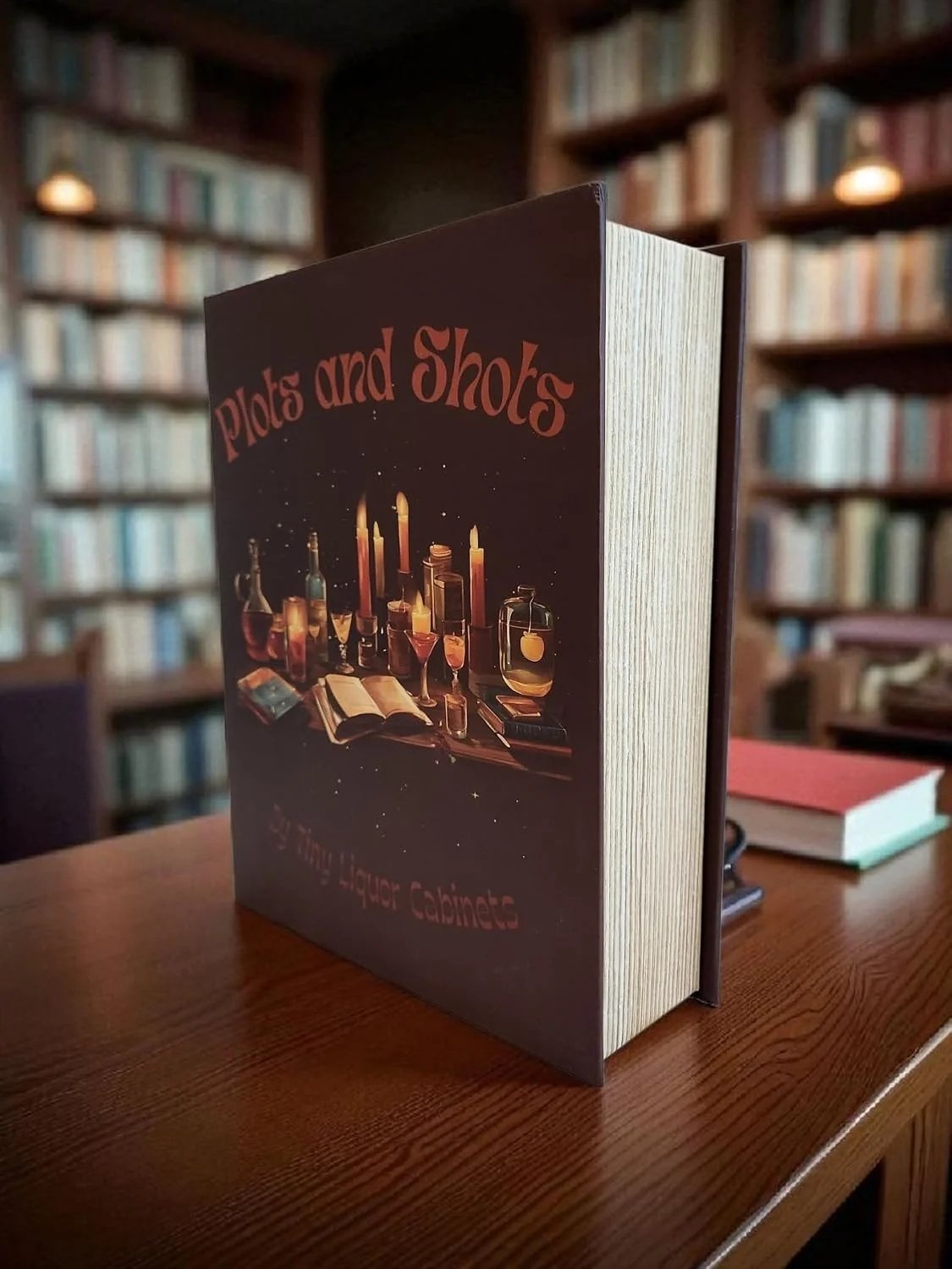 Plots and Shots front cover displayed on a table