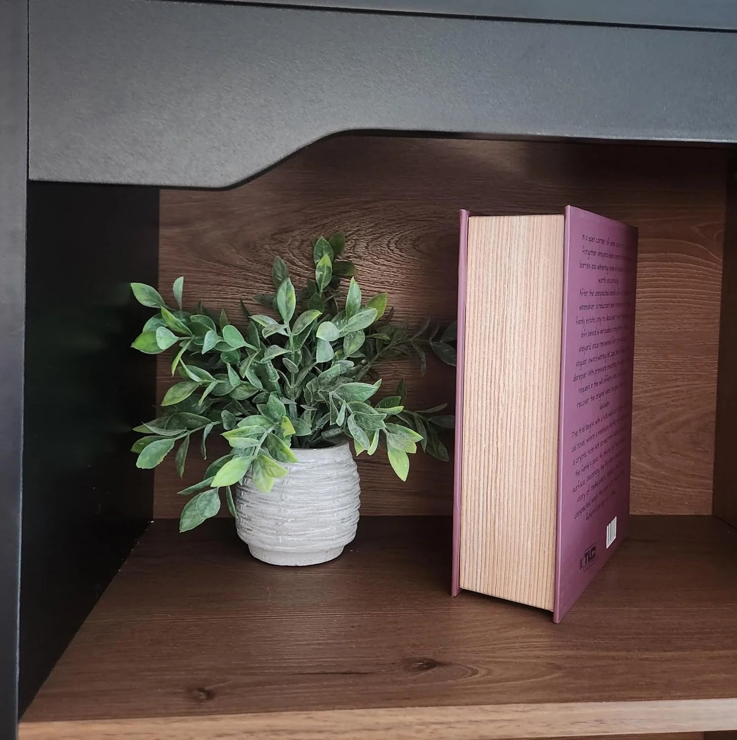 Side view of Uncorking the Mystery displayed on a shelf
