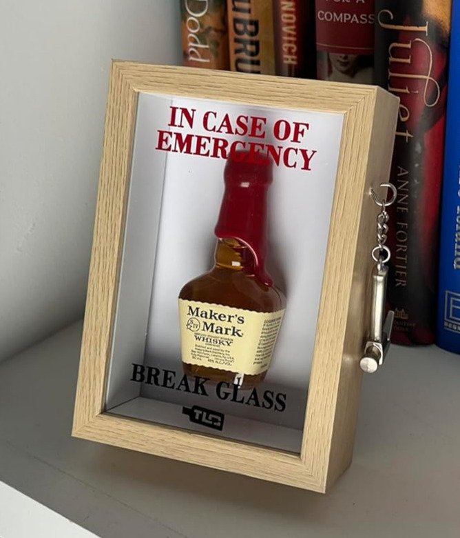 Nature Deluxe 3D Emergency Break Glass display box on a bookshelf